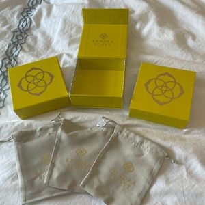3 Kendra Scott bags and boxes